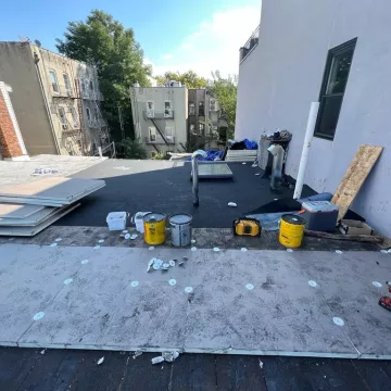 flat rubber roofing applied on the roof